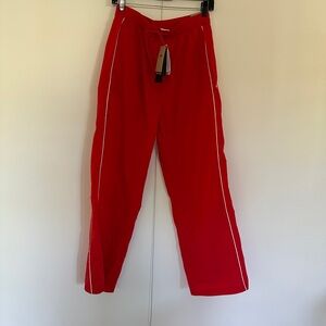 Red Track Pants with White Stripes